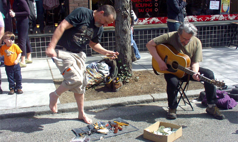 Artis the Spoonman with Jim Page at Ballard Farmers Market